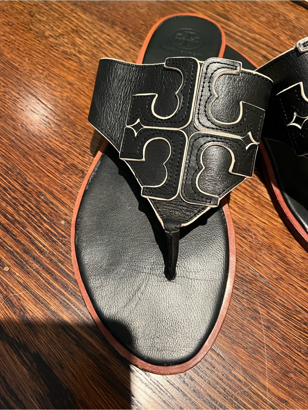 Tory Burch Black Leather Logo Thong Sandals with white detail. - Picture 3 of 4